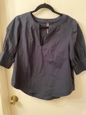 Classic Black Women's Split-Neck Top with puff sleeves